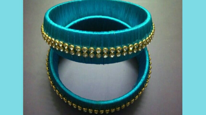 Silk Thread Bangles: Blue color wrapped bangles and decorated with stone lace